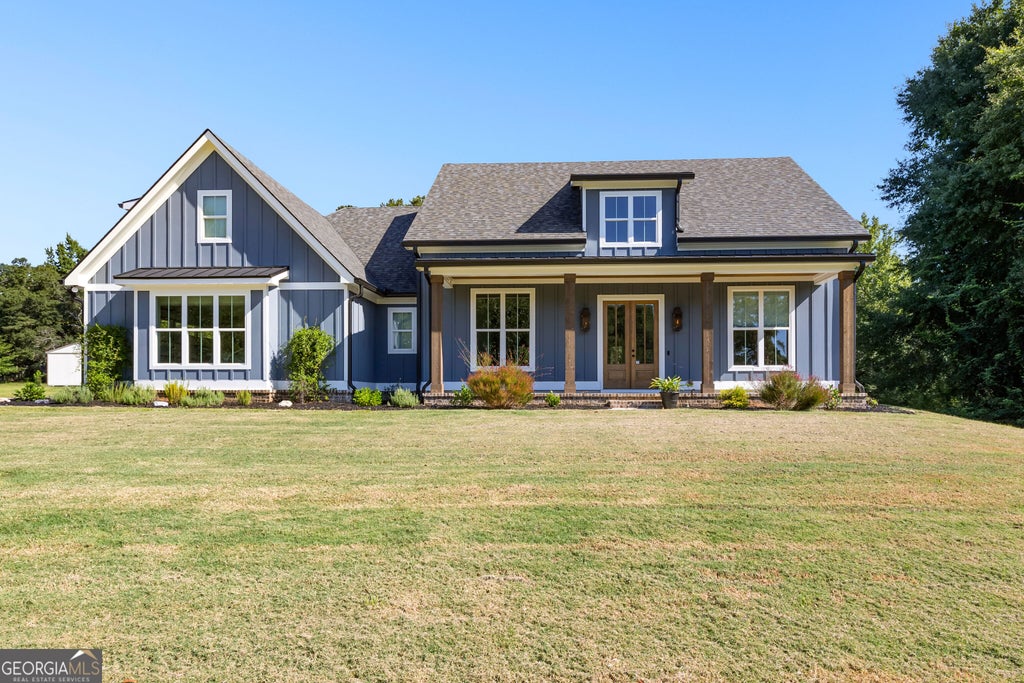 Photo of 1005 Goza Rd, Fayetteville, GA 30215 (MLS # 10842756)
