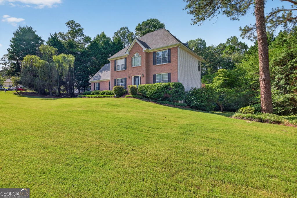Photo of 860 Scenic Lake Drive, Lawrenceville, GA 30045 (MLS # 10792565)