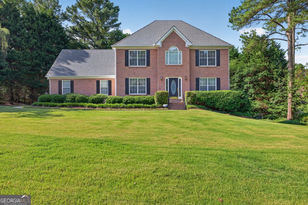 Photo of 860 Scenic Lake Drive, Lawrenceville, GA 30045 (MLS # 10792565)