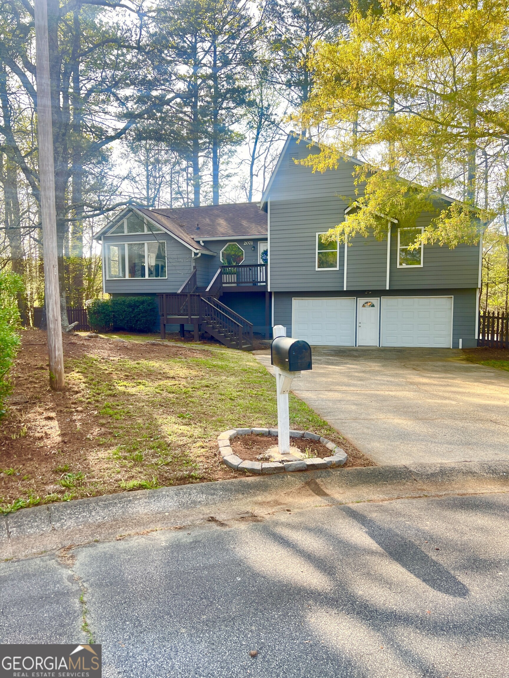 Charming 3- Bedroom Home in Desirable Sprayberry Station Discover a hidden gem in the highly sought-after Sprayberry Station neighborhood! Nestled in a quiet and well-maintained community, this spacious 3 bedroom, 3-bathroom home is the perfect place to call home. Step inside to find a bright and inviting kitchen featuring granite countertops, stainless steel appliances, and a gas range-perfect for cooking and entertaining. Conveniently located just off the kitchen, the laundry room adds extra ease to daily living. The versatile lower level in the garage offers additional living space, to be used as a fourth bedroom with a full bath, and a finished area ideal for a home gym, office, or entertainment space. With both interior and exterior access, this level is perfect for guests, in-laws, or a private workspace. Additional highlights include: Spacious and functional layout Quiet, established neighborhood Home warranty included Two refrigerators to remain Don't miss this incredible opportunity-schedule your showing today!