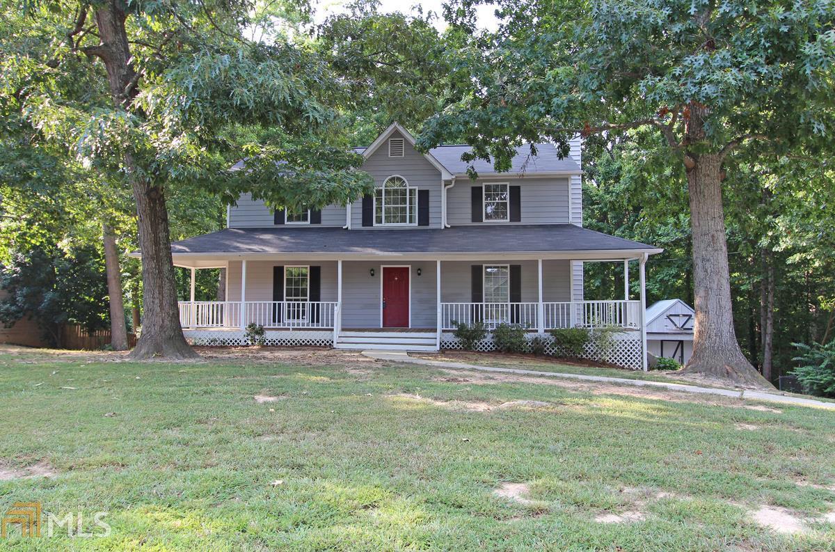 Beautiful (2) story home with wrap around front porch and private backyard. Large family room with stone fireplace, large laundry/mud room. Partial finished basement with new tile. Playhouse and storage building.