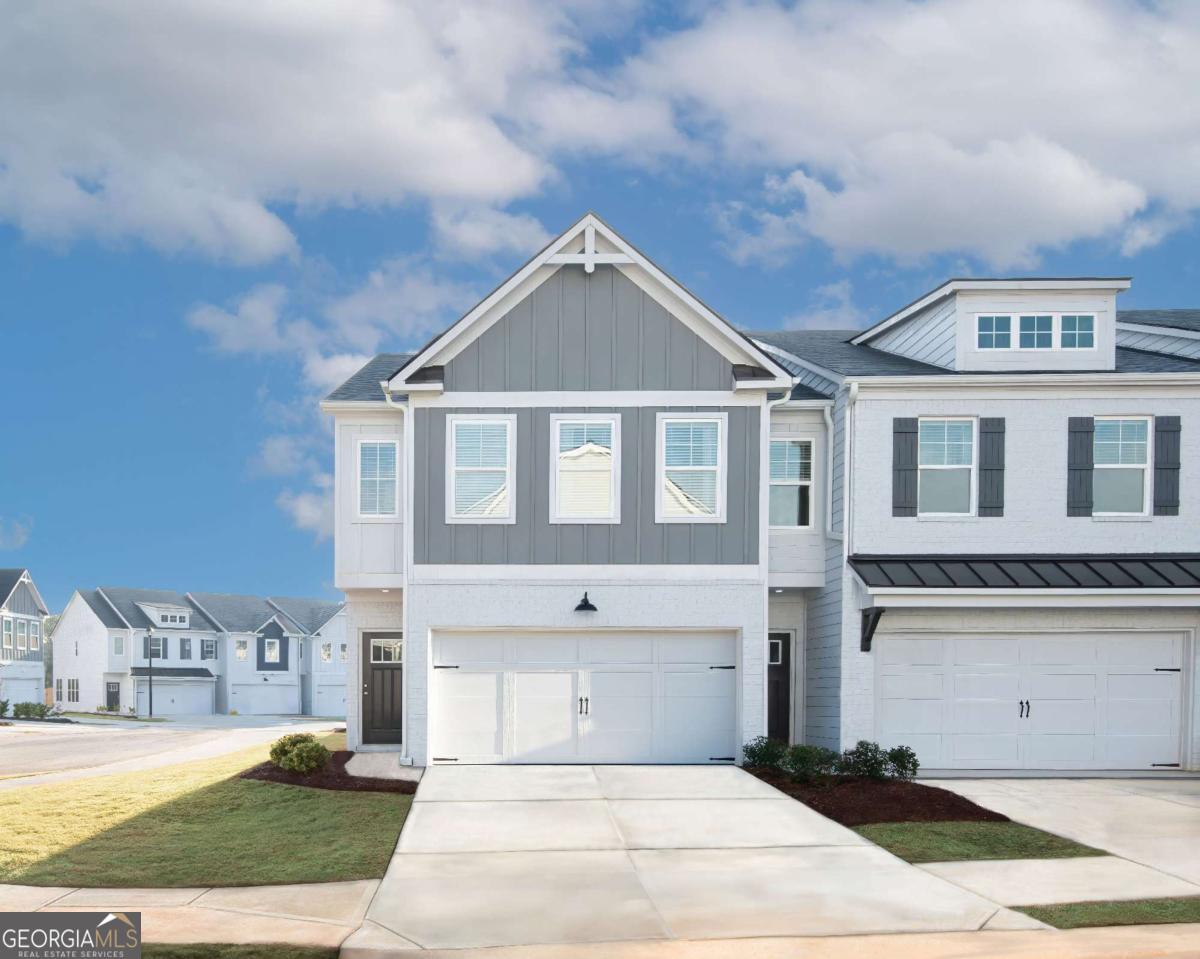Enjoy Maintenance Free Living in this Beautiful New Swim Community Located In Conyers- Escape the Hustle and Bustle off the City Yet Conveniently Located Off I-20 Minutes From Shopping, Dining and Georgia Horse Park. The Hanover Model Offers 3BD/2.5 BA W/Two Car Front Entry Garage, A Gourmet Eat-In Kitchen White Cabinets, Walk-In Pantry, Granite Countertops, Huge Island, Overlooking Cozy Family Rm, a Great Open Concept For Dining and Entertaining with Luxury Vinyl Flooring on Main, Upstairs Offers Two Oversized Secondary Bed RMS W/Walk-In Closets, Laundry Closet, Inviting Owners Suite W/Tray Ceiling, Sitting Area, Huge WIC Closet, Raised Vanity W/Dual Sinks, Granite Countertops, Luxury Vinly Plank Flooring, Relaxing Garden Tub and Separate Walk-In Shower, A Spacious Loft/Game RM Great For Entertaining Or Perfect Home Office. *Photos of Similar Decorated Model. HURRY IN FOR A LIMITED TIME RECEIVE 30 YR FIXED RATE AT 4.99% (5.91% APR) + $10,000 ANYWAY YOU WANT IT - W/PREFERRED LENDER BANKSOUTH MORTAGE. SEE AGENT FOR DETAILS.