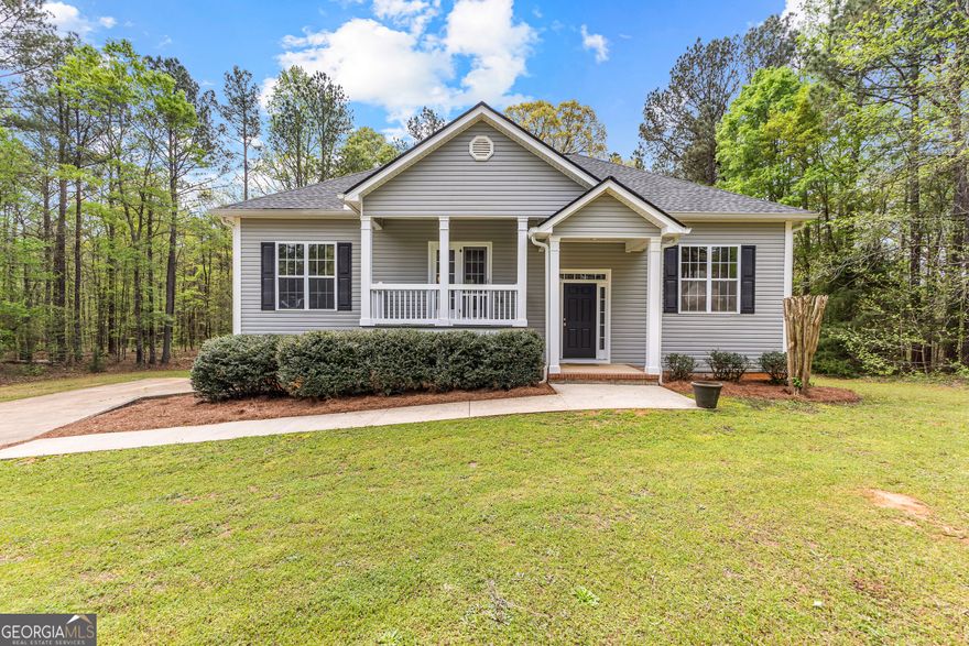This renovated split bedroom floor plan is just waiting for you to move in! The house has NEW ROOF, NEW PAINT, NEW FLOORING, NEW LIGHTING AND NEW HARDWARE throughout.  As you walk to the front door notice the front verandah perfect for sipping an early morning coffee.  The main floor open concept living area is perfect for entertaining while providing coziness for those family game nights.  The kitchen boasts NEW STAINLESS APPLIANCES (including new refrigerator), NEW SOLID SURFACE COUNTERTOPS, and NEW SINK with UPGRADED FAUCET for family and guests to gather around. Either open space can serve as an eating area or living area or use both as a living area and use the large kitchen island for your eating needs.  Off the kitchen is an oversized composite material deck (i.e. no staining) perfect for the family to grill and enjoy an outside meal with partial retractable awning to provide cover on extra sunny days. The Master Suite off one side of the living area features a large room with fabulously upgraded ensuite including NEW WALK OUT TILE SHOWER, NEW SOAKING TUB, AND NEW BEAUTIFUL SOLID SURFACE COUNTERTOPS (double vanity) and a walk-in closet.  On the other side of the house, two secondary bedrooms with a hall bath with NEW VANITY and NEW COUNTERTOP with new fixtures.  Downstairs provides a flex space that can easily be used as a very large bedroom and bath with storage large finished storage room or a small bedroom with living area and bath or an entertainment/game/theater room depending on your desires.  Downstairs bath has all NEW FIXTURES. Downstairs has interior and exterior entry if wanting to rent out a basement apartment.  Additional large unfinished storage area perfect for shop or finish it off for an extra "man cave" or craft room. Large laundry closet downstairs as well.  The private backyard is a blank slate ready to be made into a great outdoor entertainment space or your cherished garden with chickens. No HOA!!!  Septic pumped 4/14 and new additional septic lines added to accommodate 4th bedroom.  10 minutes to vibrant Senoia; 5 minutes to HWY 85.