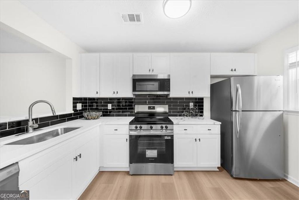 Photo of 4212 Stillwater Drive, Duluth, GA 30096 (MLS # 10700398)