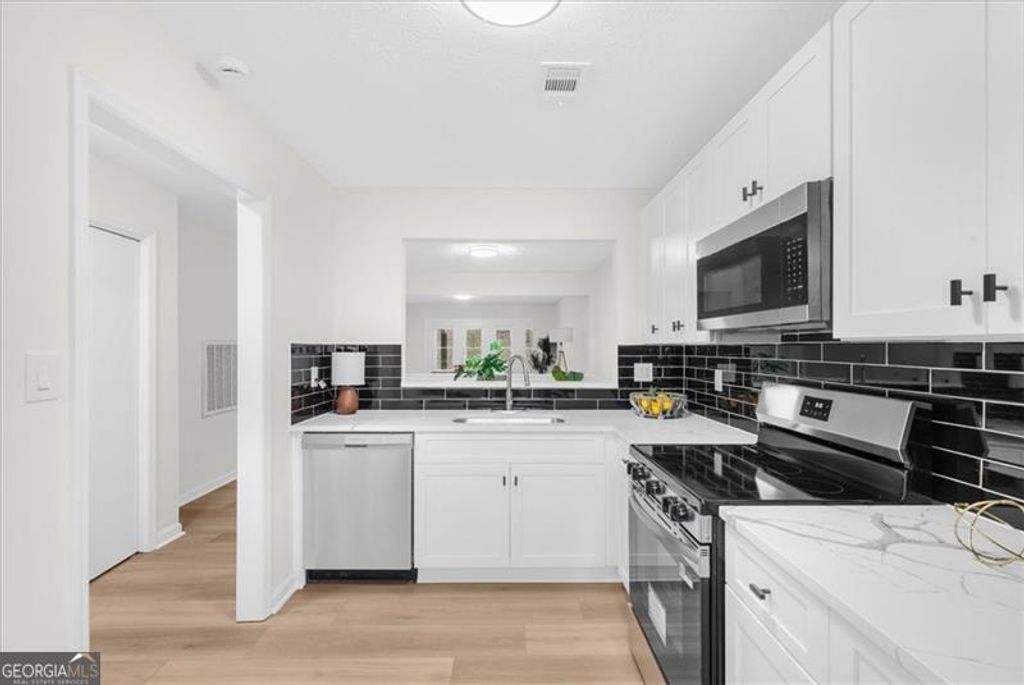 Photo of 4212 Stillwater Drive, Duluth, GA 30096 (MLS # 10700398)