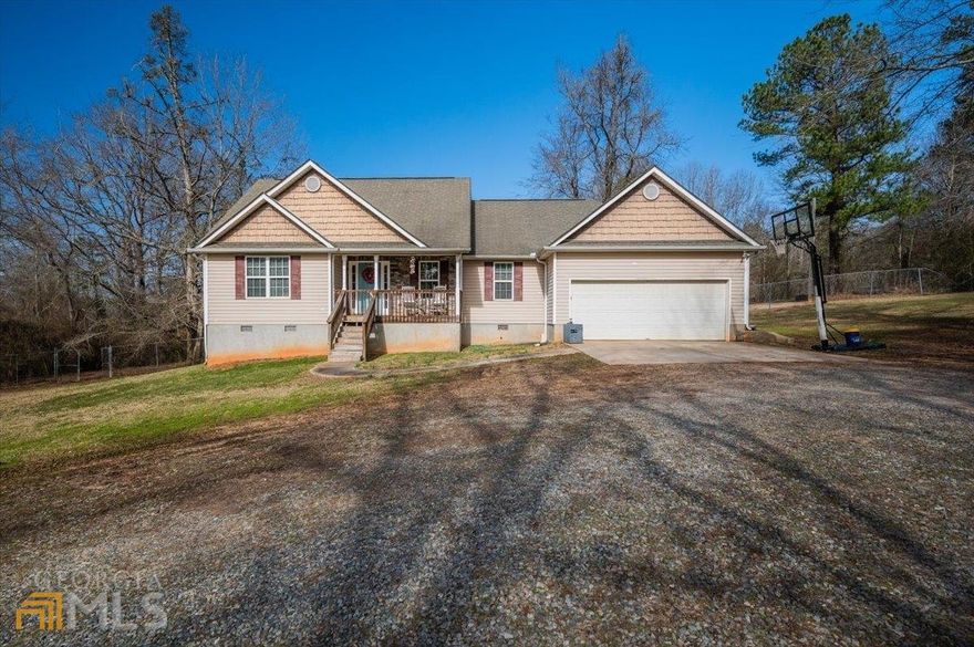 Welcome to your sweet country abode! This 3 Bed/2 Bath home is located in Monroe County on 2 acres. Fireplace, covered porch, back deck, 2 car garage, and a newly added 21x17 den will check all your boxes. Call today!!