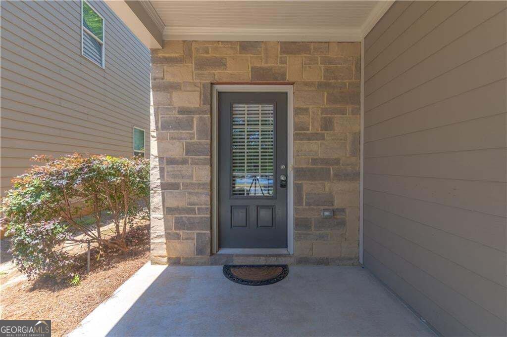 Photo of 5046 Apple Grove Road, Buford, GA 30519 (MLS # 10874857)