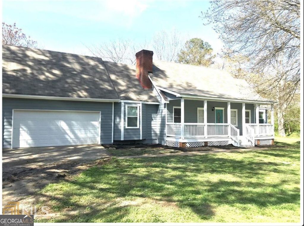 Photo of 6744 Rockbridge Road, Stone Mountain, GA 30087 (MLS # 10631286)