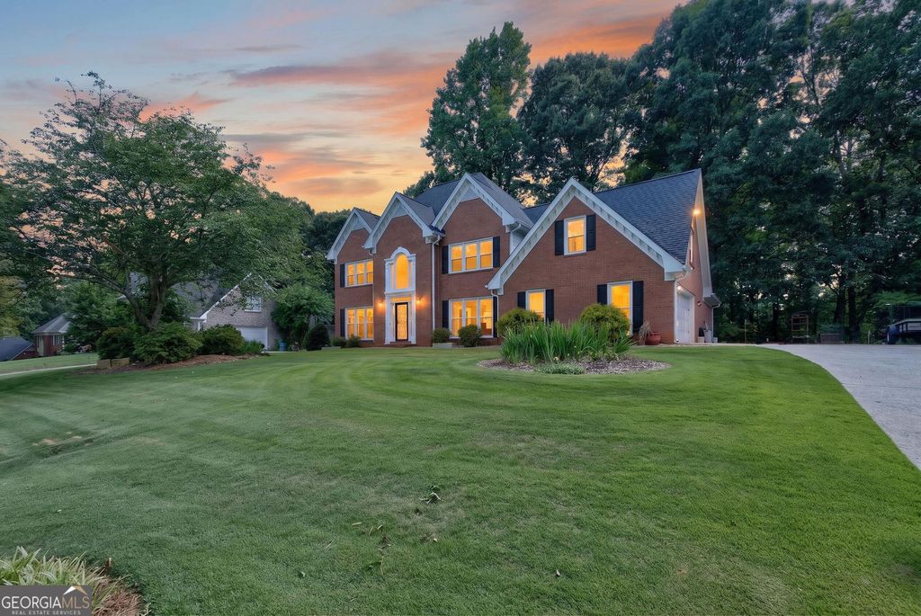 Photo of 1235 Buice Dr. SW, Lilburn, GA 30047 (MLS # 10771019)