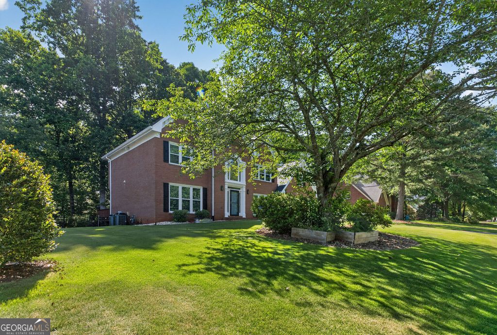 Photo of 1235 Buice Dr. SW, Lilburn, GA 30047 (MLS # 10771019)