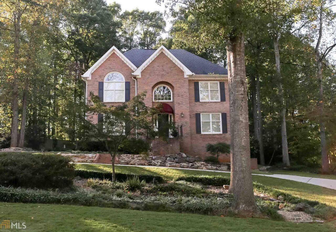 Welcome Home to this well appointment Estate home in the desired neighborhood of White Oak. This 4 sided brick home is as beautiful on the outside as it is on the inside. Once you walk in the door, you will feel the love that this house has shown these owners for so many years. The main floor features, a foyer entrance, hardwood floors throughout the main, formal living room/office, formal dining room, open, spacious, and updated kitchen, breakfast room, family room with custom built-ins, fireplace and so much natural light! The downstairs also features a guest suite with updated full bath. The kitchen has custom cabinetry, granite countertops, separate cook top and oven, lighting, and paint. The upstairs features 2 additional guest suites with a full bath. The master suite is just dreamy, the master bath has been completed updated with double vanities, granite counters, a lovely whirlpool bath, and tiled walk-in shower, and an amazing walk-in closet with custom shelving system. The full finished basement features an in-law suite with full kitchen, laundry room, full bath, one bedroom, and and additional flex space, living room and breakfast area. There is a separate entrance for the basement as well. This make it perfect for so many options. There is also an additional 30/25 detached garage with workshop, sink, benches, drawers, 220 Power, and a loft apartment upstairs with a separate entrance. This home has so many wonderful features and options! There is new carpet throughout the whole house, new paint throughout the whole house, garage, and loft apartment, updated bathrooms, the plumbing and HVAC units have also been inspected and serviced. The convenience factor is spot on with this home too, you just cannot beat it!
