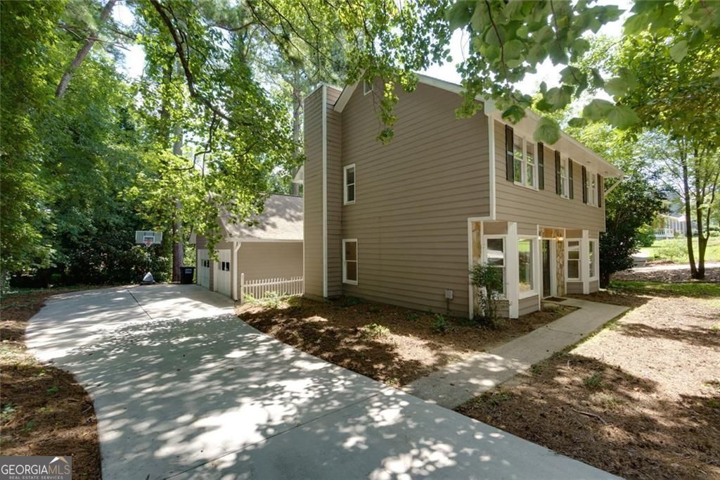 Photo of 1200 Mitsy Forest Drive NE, Marietta, GA 30068 (MLS # 10650075)
