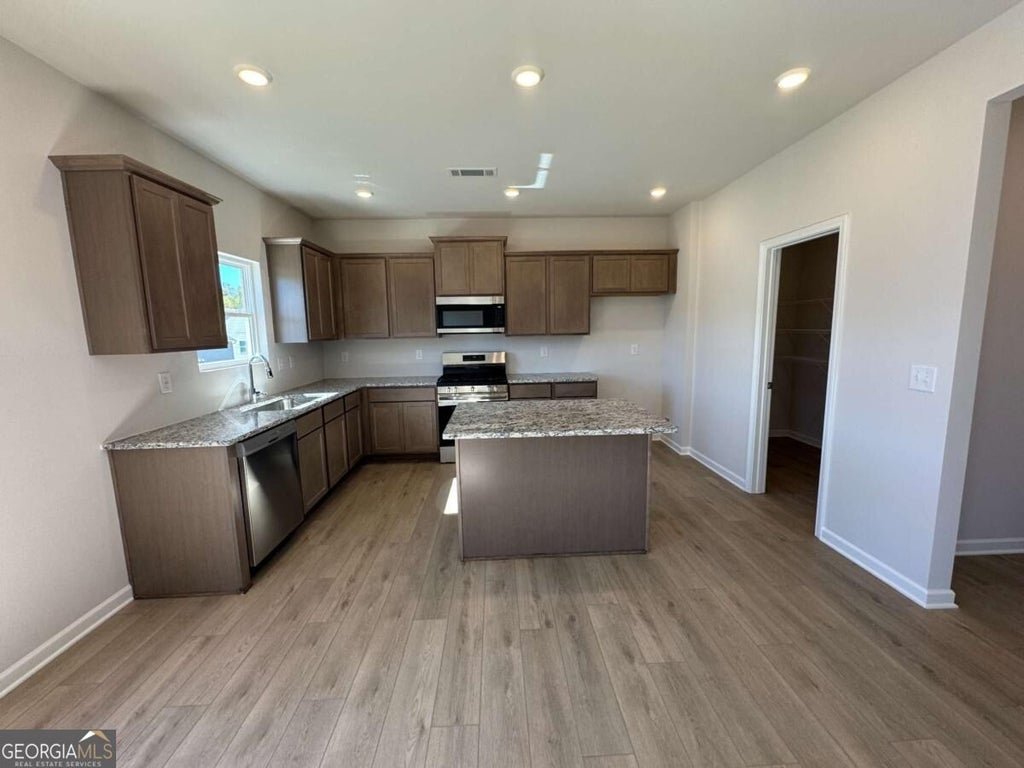Photo of 821 Oakmont Trace, Canton, GA 30114 (MLS # 10878744)