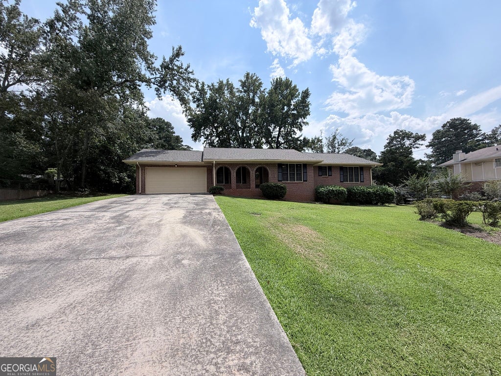 Photo of 2305 Village Drive, Covington, GA 30016 (MLS # 10835559)