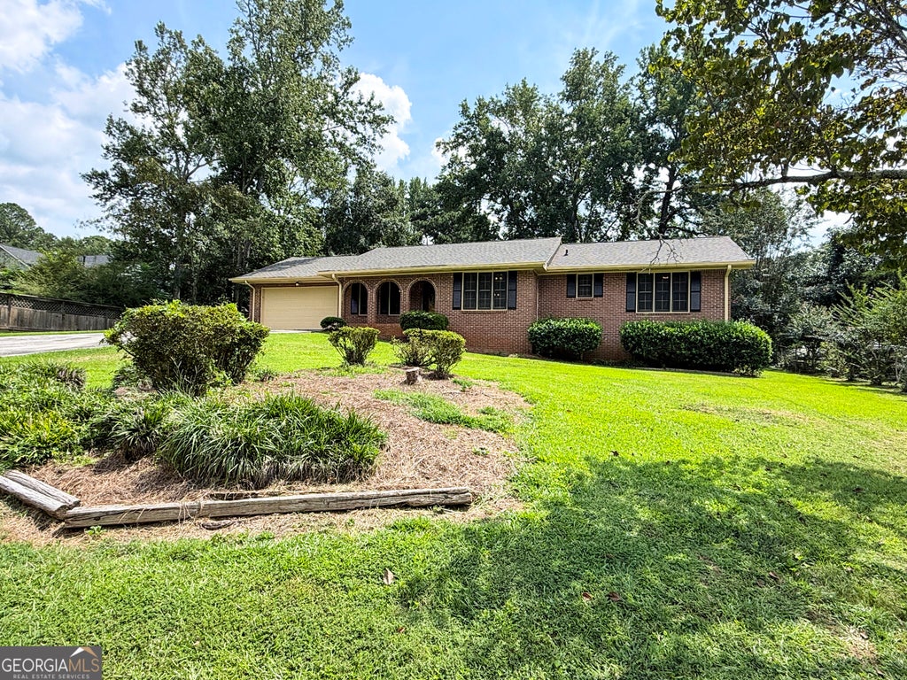 Photo of 2305 Village Drive, Covington, GA 30016 (MLS # 10835559)