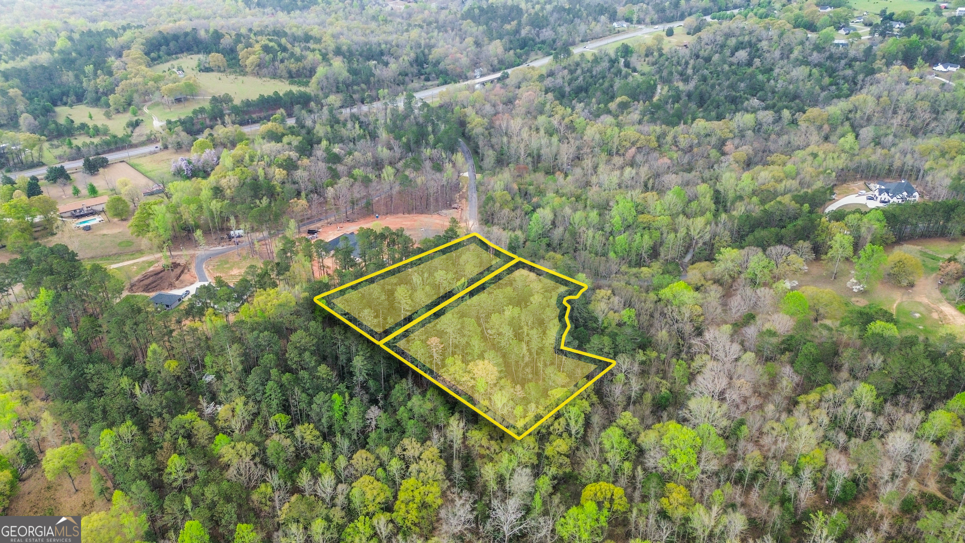 Lot 1 Jack Pittman Rd, Dacula, GA 30019 - 4.52 Acres Gorgeous 4.52-acre wooded lot in a peaceful, private location on Jack Pittman Rd in Dacula. Mature trees offer natural shade and privacy, while a tranquil creek flows along the left side of the property-ideal for building your dream home or a quiet retreat. A new survey has just been completed, and Level 4 soil studies are available, saving time and expense for the buyer. Don't miss this incredible opportunity to own a piece of nature while staying close to local amenities. Contact Lulu Rodriguez Bartlett at 404-578-6355 or email offers to lulurebartlett@gmail.com.