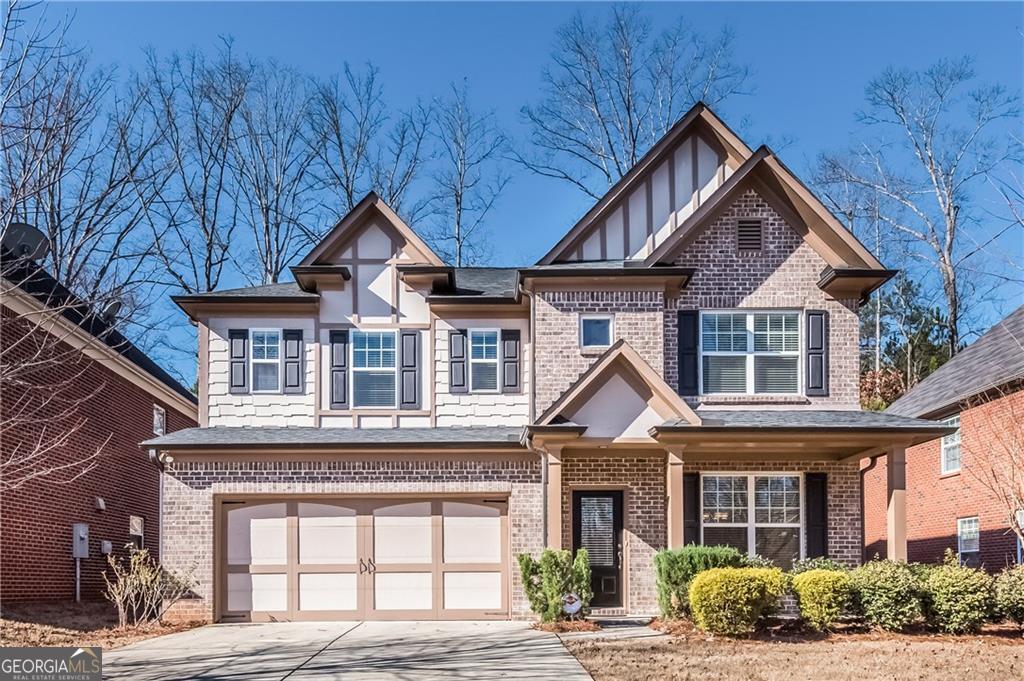 Wonderful 5 bedrooms, 4 bathrooms home in popular Mabry Park, located in Johns Creek. Hardwood floors on main level. Inviting 2 story foyer with a separate dining room, fireside family room; Gourmet kitchen features stainless steel appliances - refrigerator, gas stove, dishwasher, microwave and an eat in breakfast area; 5th bedroom and 4th full tiled bathroom on the main level; Glamorous owner's retreat is upstairs and features an oversized bedroom with a sitting room, trey ceilings, tiled bathroom has a garden tub, separate shower, dual vanities and a huge walk-in closet; 3 additional spacious bedrooms - 1 with a private tiled bathroom and the other 2 share the Jack/Jill style tiled bathroom; Walk-in laundry room and open loft area; Very private level back yard is fenced; covered patio; Almost in the cul-de-sac; Close to major highways, Ga400, Big Creek Greenway, Ymca, Emory hospital, shopping, dining etc.... Top schools.