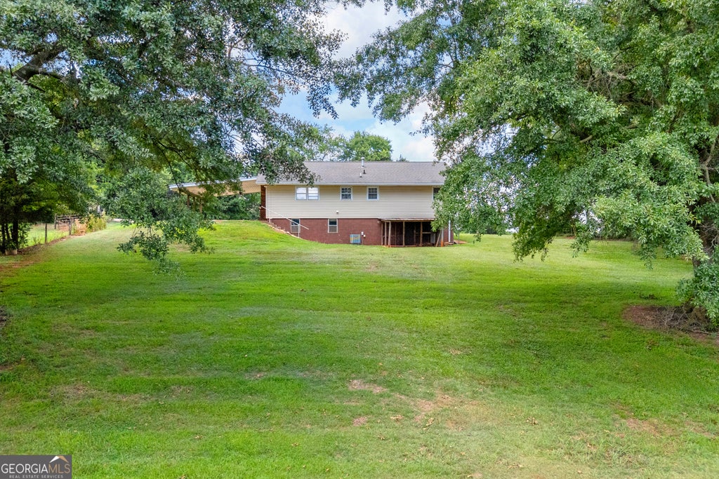 Photo of 6091 Stone Bridge Road, Carnesville, GA 30521 (MLS # 10804826)