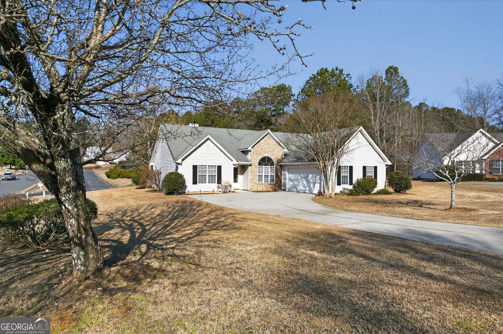 Photo of 5186 Sudbury Point Lane, Sugar Hill, GA 30518 (MLS # 10817370)