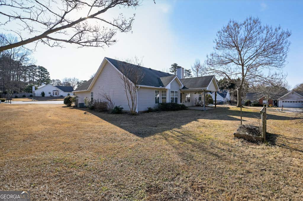 Photo of 5186 Sudbury Point Lane, Sugar Hill, GA 30518 (MLS # 10817370)