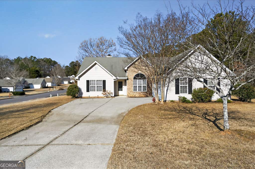 Photo of 5186 Sudbury Point Lane, Sugar Hill, GA 30518 (MLS # 10817370)