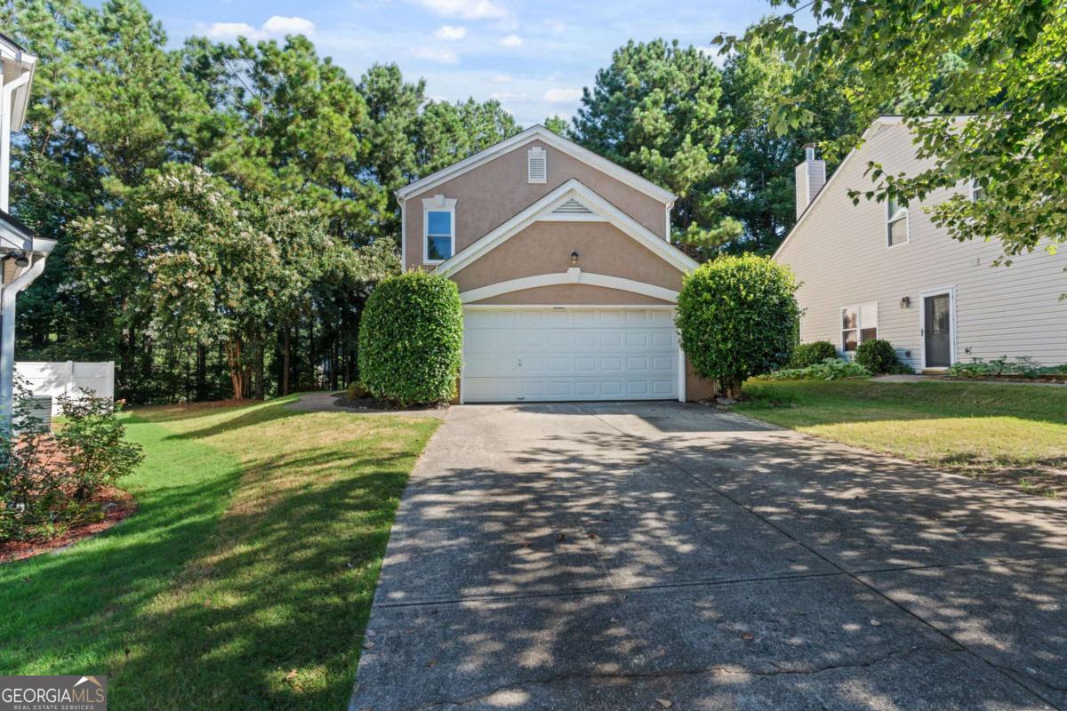 Welcome to a rare find in the highly sought-after Hutchinson Pointe Subdivision! Nestled at the end of a peaceful cul-de-sac, this charming 3 bed, 2.5 bath home is loaded with updates and personality. Enjoy brand-new flooring throughout, sleek new kitchen countertops, and a brand-new furnace to keep things cozy. The kitchen is a cook's dream with a gas stove and oven, while the living room offers a warm gas-log fireplace for those crisp Georgia evenings. Step out back to your own private oasis-complete with a fire pit and tranquil wooded views. It's the perfect spot for morning coffee or evening s'mores under the stars. Located in the quietest pocket of the neighborhood, this home offers both serenity and convenience. Just minutes from Hwy 400, top-rated schools, and premier shopping including The Collection at Forsyth. Neighborhood amenities include swim, tennis, and a clubhouse-everything you need for easy living in the heart of Cumming.