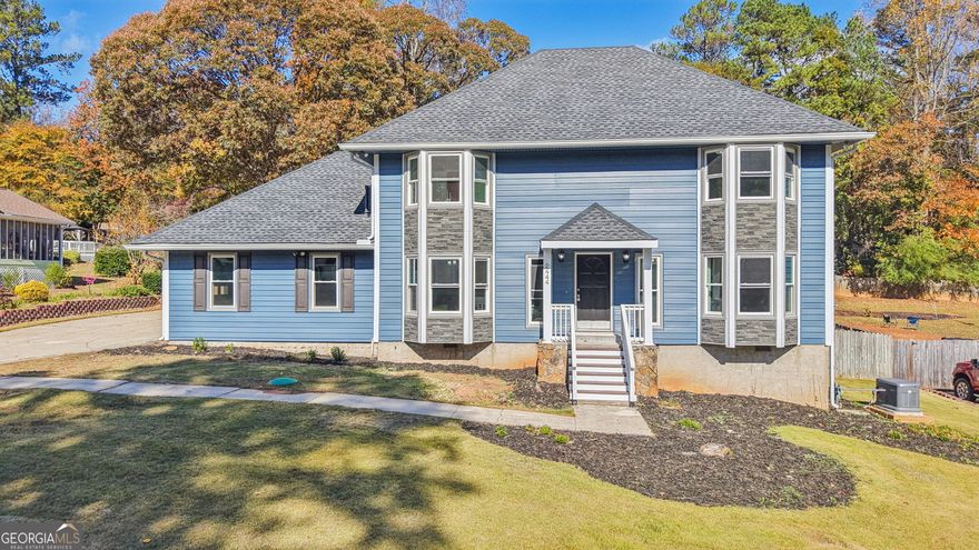 NEWLY RENOVATED and MOVE-IN READY! RENT-TO-OWN PROGRAM AVAILABLE TOO! Welcome to Carnes Plantation, a very established and sought-after Jonesboro community known for its large lots, lush green spaces, friendly neighbors, and tranquil atmosphere. This exquisitely remodeled 2-story gem rests near the center of the community and is priced to sell. This home has strong bones, and nearly everything else about it is less than 3 years young! It features NEW safety railings at the front entrance, NEWER exterior siding and roof shingles; NEWLY replaced HVAC systems, water heater, and whole house generator; NEW hardwood flooring throughout the main level, and NEW automatic garage doors. This home also boasts a NEWLY REMODELED granite kitchen with stainless steel appliances, making meal preparation a delight. All 3 bathrooms have been NEWLY remodeled with modern finishes. The entire interior has been freshly painted, and there is a NEW wood privacy fence in the rear. In spite of all the new updates, the interior layout with its beautiful crown molding, wainscoting and classic brick fireplace remain as part of the home's original charm. To top it off, the rear of the home can be a sanctuary for relaxation or your entertainment paradise. While protected from pesky mosquitos, you could enjoy yoga, music, a cigar, your favorite book and libation, or kick off a slamming family barbecue inside your oversized screened-in deck. Just beyond the deck rests an enticing, crystal clear, in-ground pool overlooking a private greenspace with beautiful Japanese maples and fig trees. This backyard space has unlimited potential, just waiting for your signature touch-ups. Conveniently located near shopping centers, restaurants, schools, and parks, this home offers the perfect combination of charm, elegance, and functionality for any individual or family - big or small.  Seller offers a pool revitalization allowance to buyer for a contract written at full list price or higher. Schedule a tour today!