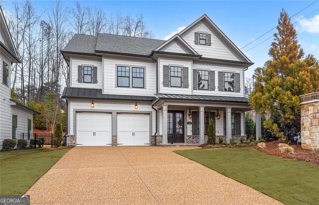 Hillandale by Award Winning Patrick Malloy Communities located in the Historic District of Roswell, near everything you need! Parks, Downtown Canton Street, Great Schools, Shopping, Entertainment, easy access to GA400 and I-75. Hillandale's architectural style is inspired by the charm of Charleston SC, with gas lanterns on every covered front porch to our pebble sidewalks and driveways. Roswell is ranked as one in the top 100 places in the country to live and one of the safest cities to live in the Atlanta metro area for 2024! The Grafton B plan is your quintessential open concept living home and does not disappoint! Hardwoods throughout main level, Kitchen boasts a large island with breakfast bar, quartz countertops, tile backsplash, stainless steel appliances the include double ovens, 36" gas cooktop, vent hood, drawer microwave and dishwasher. There is a hidden walk-in pantry with appliance bar and the dining area has shiplap wall detail, Family room with gas fireplace flanked by built-in cabinetry. There is a guest bedroom on main level with access to a full bath, storage in this home is abundant! A covered rear patio off of kitchen provides an extension for entertainment space, level backyard that backs up to greenspace! Upstairs has a loft for added entertaining area and hardwood flooring, two spacious secondary bedrooms with full baths. The primary suite boasts hardwood flooring, a morning bar, and a sitting area with shiplap wall trim detail. Well-appointed ensuite with quartz countertops, huge spa-like shower, free-standing tub, vanities are separated by a convenient bench for seating, large walk-in closet and a linen closet. HOA provides lawn maintenance for front and backyards! This is the final opportunity to buy new construction in Hillandale at an incredible savings, home is ready to close!