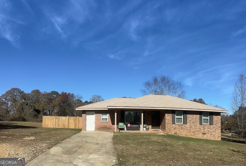 Get your new home for the holidays. This cozy 3 bedroom plus large bonus room, 1.5 full bathroom ranch home is a gem and priced aggressively! It is being sold as-is, presenting a fantastic opportunity for those looking to put their personal touch on a property. This home offers spacious family room. Eat-in kitchen with brand new refrigerator. Located in a quiet, well established community on a nice fenced lot, this home has several wonderful features. It is conveniently located to the amenities, shops and restaurants that Covington and Conyers have to offer as well as convenient to I-20. It has a 2-year old roof and brand new water heater and AC from 2023. Schedule your exclusive showing today.