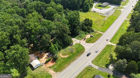 Photo of 5895 Cumming Highway, Canton, GA 30115 (MLS # 10522418)