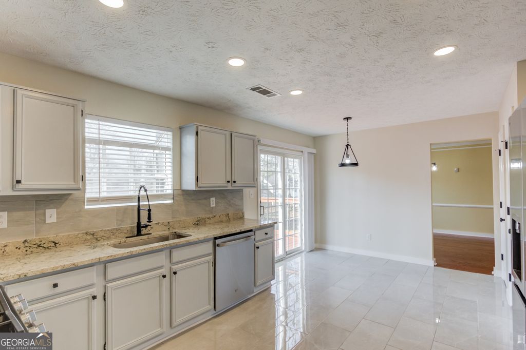 Photo of 5281 Bridgewater Trace, Stone Mountain, GA 30088 (MLS # 10689753)