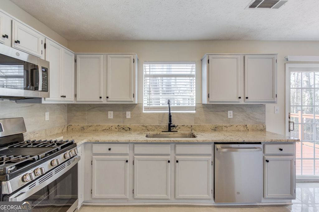 Photo of 5281 Bridgewater Trace, Stone Mountain, GA 30088 (MLS # 10689753)