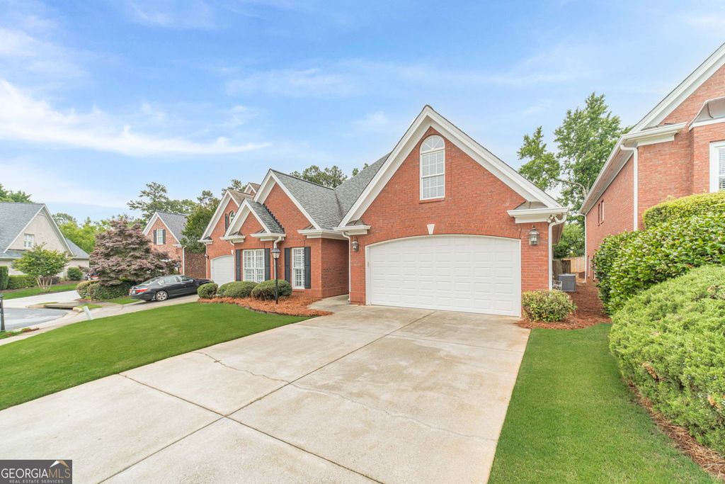 Photo of 1980 Glenhurst DR, Snellville, GA 30078 (MLS # 10772515)