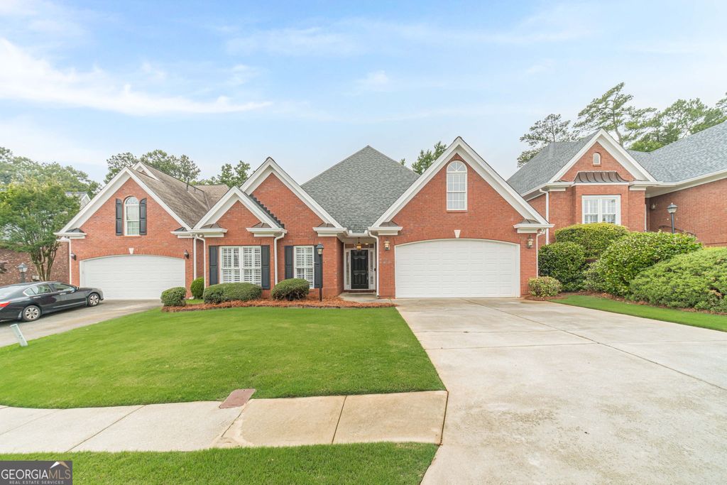 Photo of 1980 Glenhurst DR, Snellville, GA 30078 (MLS # 10772515)