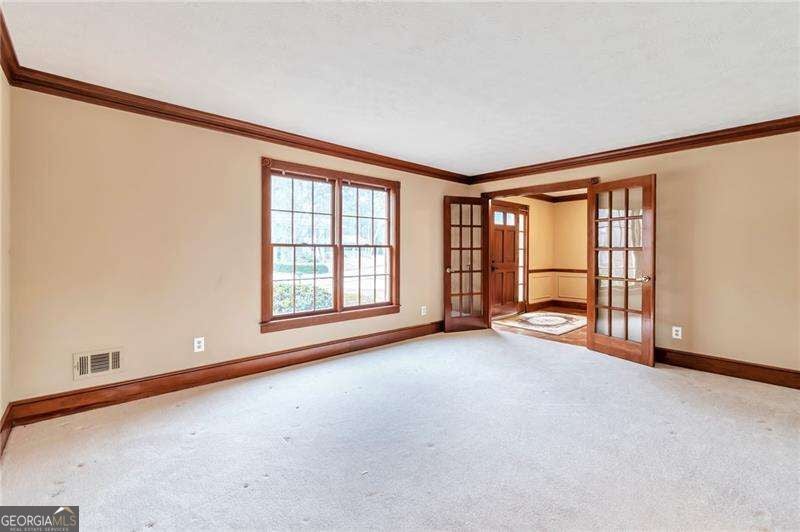 Photo of 1306 Arlene Court SW, Lilburn, GA 30047 (MLS # 10839718)