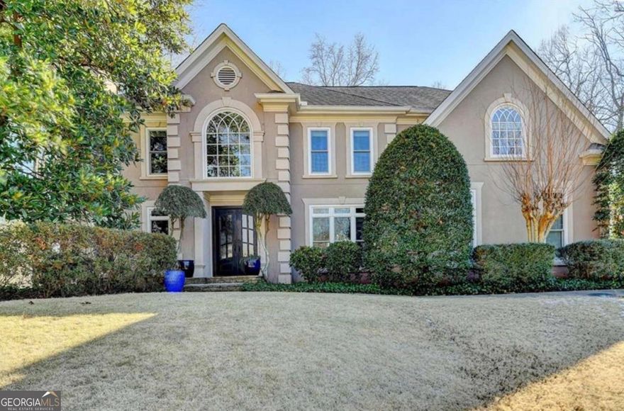 Discover this stunning 6-bedroom, 5-bathroom gem in the heart of Alpharetta! Boasting over 5,000 sq. ft. of immaculately maintained living space, this home is a true showstopper. Hardwood floors flow seamlessly throughout the main level, and the updated kitchen features modern appliances, making it the perfect space for cooking and entertaining. Nestled on a large, private lot in a quiet cul-de-sac, this property offers peace and privacy, with newly installed windows, fresh garage doors, and a grand double steel door entryway. The fully finished terrace level is an entertainer's dream, complete with a theater room, exercise space, and expansive recreational areas. This home is move-in ready and shows beautifully. It's perfect for families or anyone seeking luxury and comfort in one of Alpharetta's most desirable neighborhoods. Homes like this don't last long-act quickly before this opportunity slips away! Realtors: This home is an easy show and guaranteed to impress. Bring your buyers today!