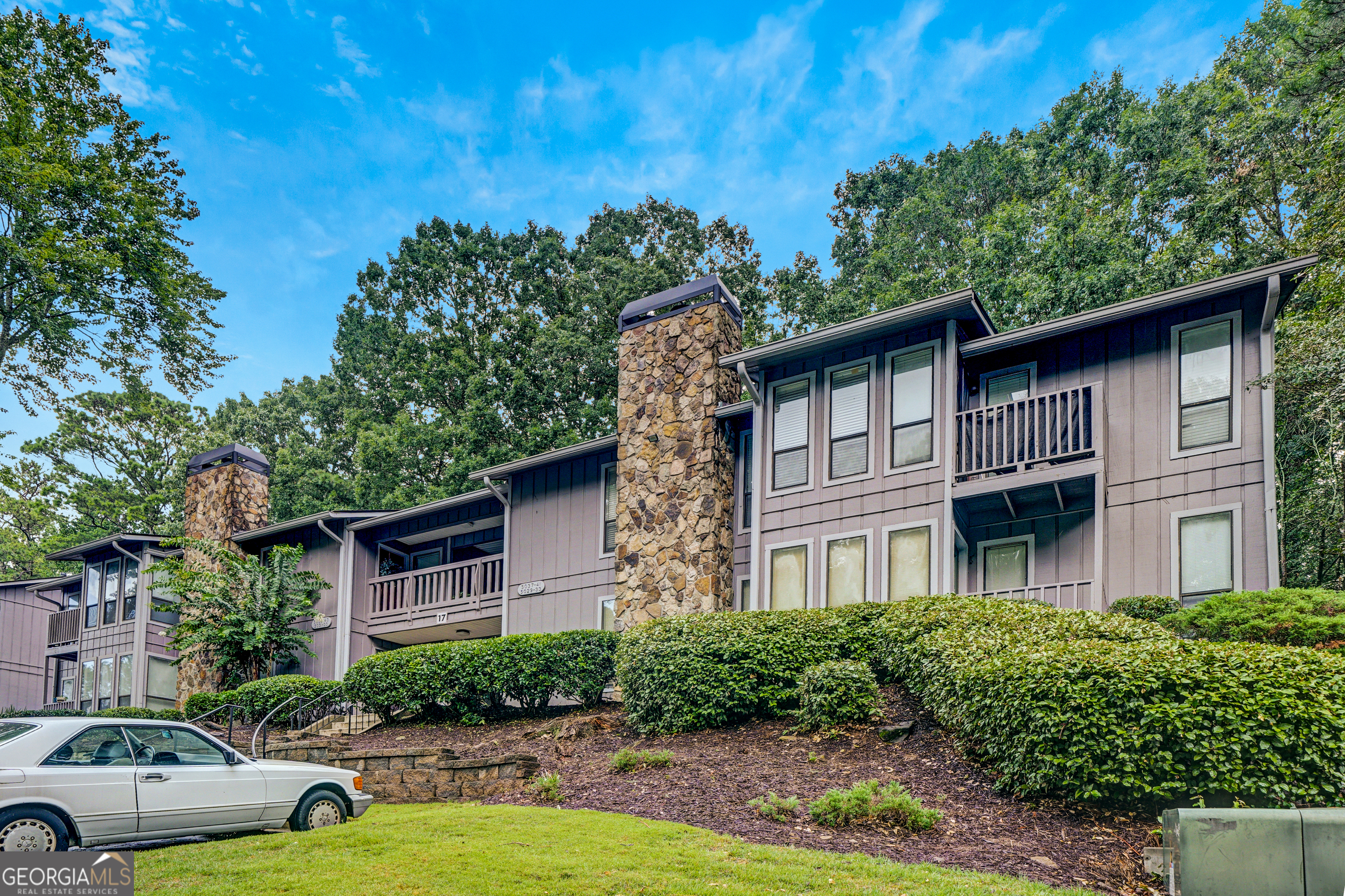 Charming 2-Bedroom Condo in the Heart of Tucker - $5,000 Seller Credit with Accepted Offer by August 15! Welcome to 5043 Woodridge Way, a bright and spacious 2-bedroom, 2-bath condo nestled in the beautifully maintained and gated Woodridge community. Seller is offering a $5,000 contribution toward buyer closing costs with an accepted offer by August 15, 2025! This move-in ready home is ideally located in the back part of the community-away from the main road-for added privacy and quiet. As a top-floor, rear-facing unit, it offers peaceful views of the trees, a feature that many buyers specifically seek out in this complex. Inside, you'll find an open-concept living and dining area with a cozy fireplace and access to a private, covered patio-perfect for morning coffee or evening relaxation. The kitchen provides ample cabinet space, a pantry, and a pass-through to the dining area, making entertaining a breeze. The oversized primary suite includes a walk-in closet and en-suite bath, while the secondary bedroom is ideal for guests, a roommate, or a home office. Woodridge offers residents low-maintenance living with impressive amenities, including a sparkling community pool and a brand-new pickleball court-a rare find in this price range! Enjoy walkable grounds, assigned parking, and easy access to I-285 and Lawrenceville Hwy. Just minutes to shopping, dining, parks, and all that Tucker and Decatur have to offer. Don't miss this opportunity to own in a desirable location with resort-style amenities-plus a limited-time closing cost incentive!