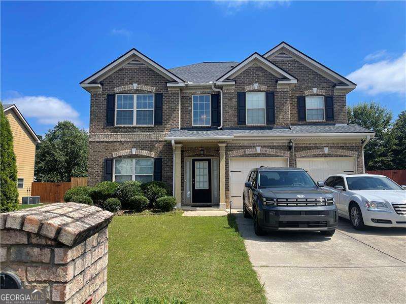 OFFERING $2,000 LENDER CREDIT IF CLOSING WITH PREFERRED LENDER! Coming Soon in South Fulton! Spacious, Stylish & Move-In Ready. Welcome to 7729 Sylvaner Lane, a beautifully maintained 4-bedroom, 2.5-bath home nestled in the desirable Palmetto Farms community in South Fulton! Step inside to an open and airy floor plan featuring over 2,800 square feet of living space, high ceilings, a formal dining room, and a spacious living area with fireplace-perfect for hosting or relaxing. The kitchen boasts stainless steel appliances, plenty of cabinet storage and views into the living space for seamless entertaining. Upstairs, the oversized primary suite offers the perfect escape with high ceilings, walk-in closet, and a luxurious bath with double vanities, soaking tub, and separate shower. Additional bedrooms are generously sized with ample light. Outside, enjoy your private backyard-ideal for grilling, family time, or just unwinding. Why You'll Love Living Here? -Swim/Tennis Community, walking trails, and a clubhouse -Just minutes to Camp Creek Marketplace for shopping, dining, and entertainment -20 minutes to Hartsfield-Jackson Airport -Close to Wolf Creek Amphitheater, Sweetwater Creek State Park, and local golf courses -Easy access to I-285 and I-85 for commuting around Metro Atlanta Whether you're upsizing, relocating, or simply looking for a peaceful, family-friendly neighborhood with modern amenities-7729 Sylvaner Lane checks all the boxes. Don't miss your chance to tour this one before it hits the market!