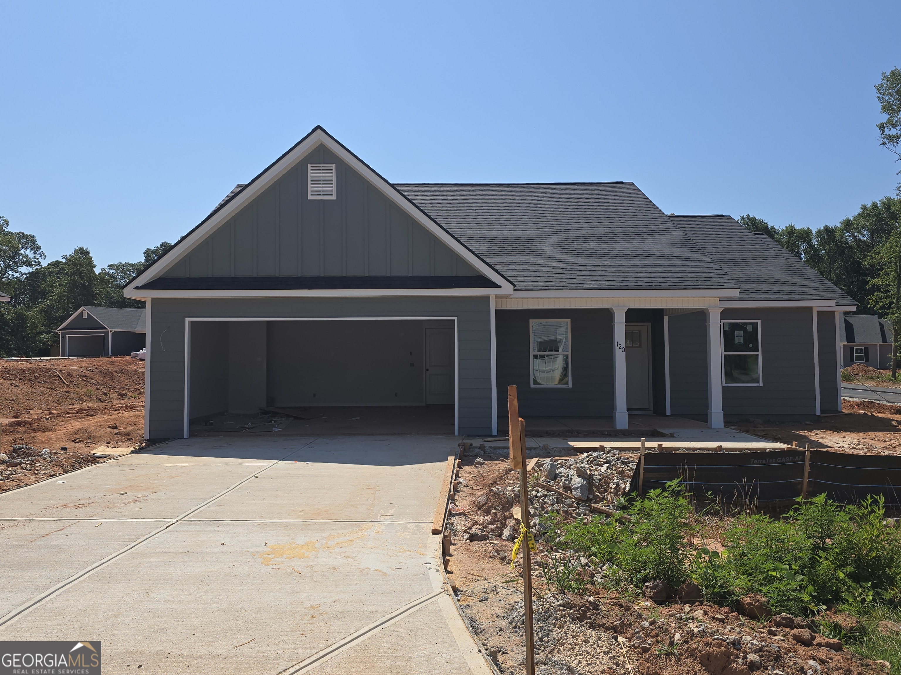 Craftsman style ranch, 4 bedroom, 2 1/2 baths, granite countertops, white custom cabinets, open greatroom with wood burning fireplace, stove, microwave and dishwasher included, dining area, master suite has double vanity, large soaking tub and separate shower, laminate and carpet flooring, patio, 2 car garage. Fields Plan Home is under construction