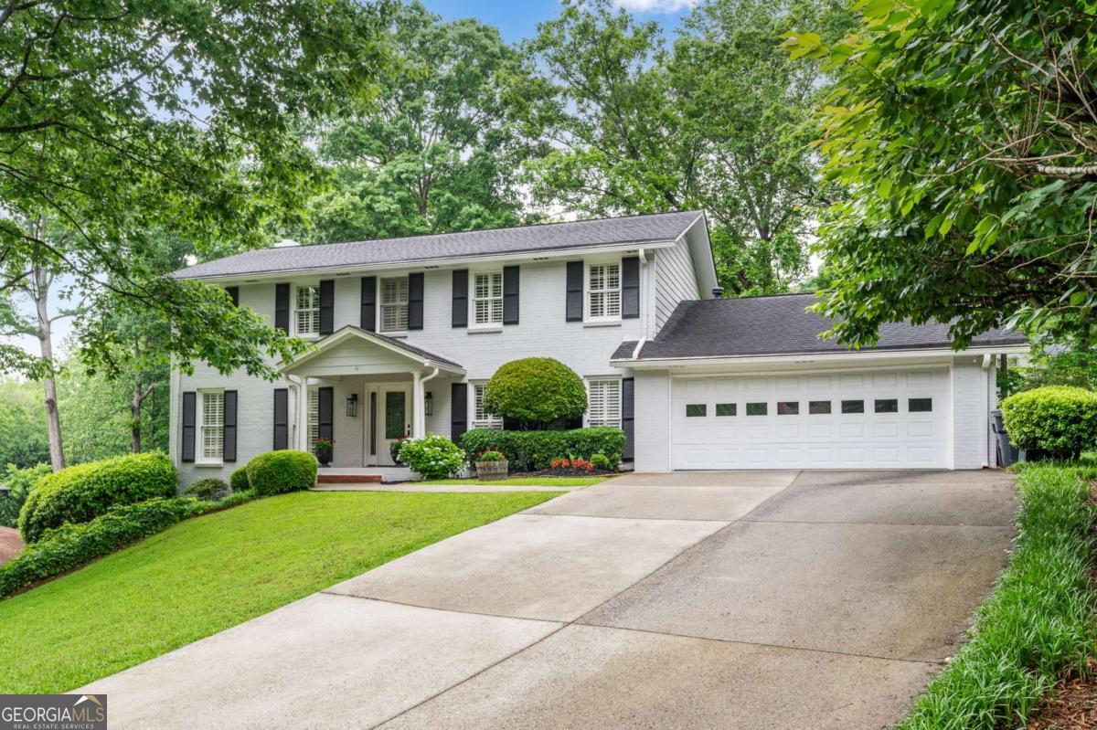 Meticulously maintained 4 Bedroom, 2.5 Bath Four-Sided Brick Traditional on Finished Basement in sought-after Walton School District. As you tnter the home into the foyer, Formal Living Room is located on the left and Dining Room to your right. Kitchen features stained cabinets, stone counters, island, stainless appliances with adjacent breakfast area and bay window. Laundry Room / Mud Room is located off Breakfast area with access to backyard. Powder Room is located between the Kitchen and Fireside Family Room with access to Screened Porch overlooking large fully fenced backyard. On the Upper Floor you will find the Spacious Primary Suite with Ensuite Bath and great closet space. Three Secondary Bedrooms and Secondary Full Bath complete the Upper Level. Hardwood Floors throughout main level. Plantation Shutters throughout entire home. Finished Basement with plenty of storage and Workshop Area. Minutes to Chattahoochee River, Chattahoochee Nature Center and Riverside Boardwalk, Downtown Historic Roswell, Avenues of East Cobb, shopping and restaurants. Home is located in quiet neighborhood with no Home Owner's Association. Homeowners may join Swim and Tennis at neighboring Hampton Lake Community for an annual fee.