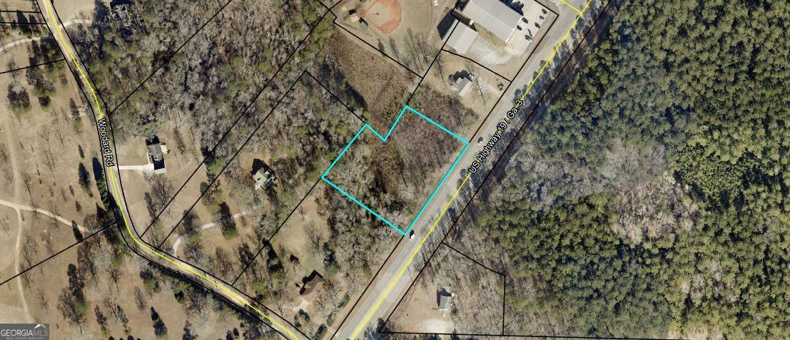 Approximately 1.69 acres of Commercial land located on Hwy 19, between Griffin and Zebulon near Racquethause Gym.