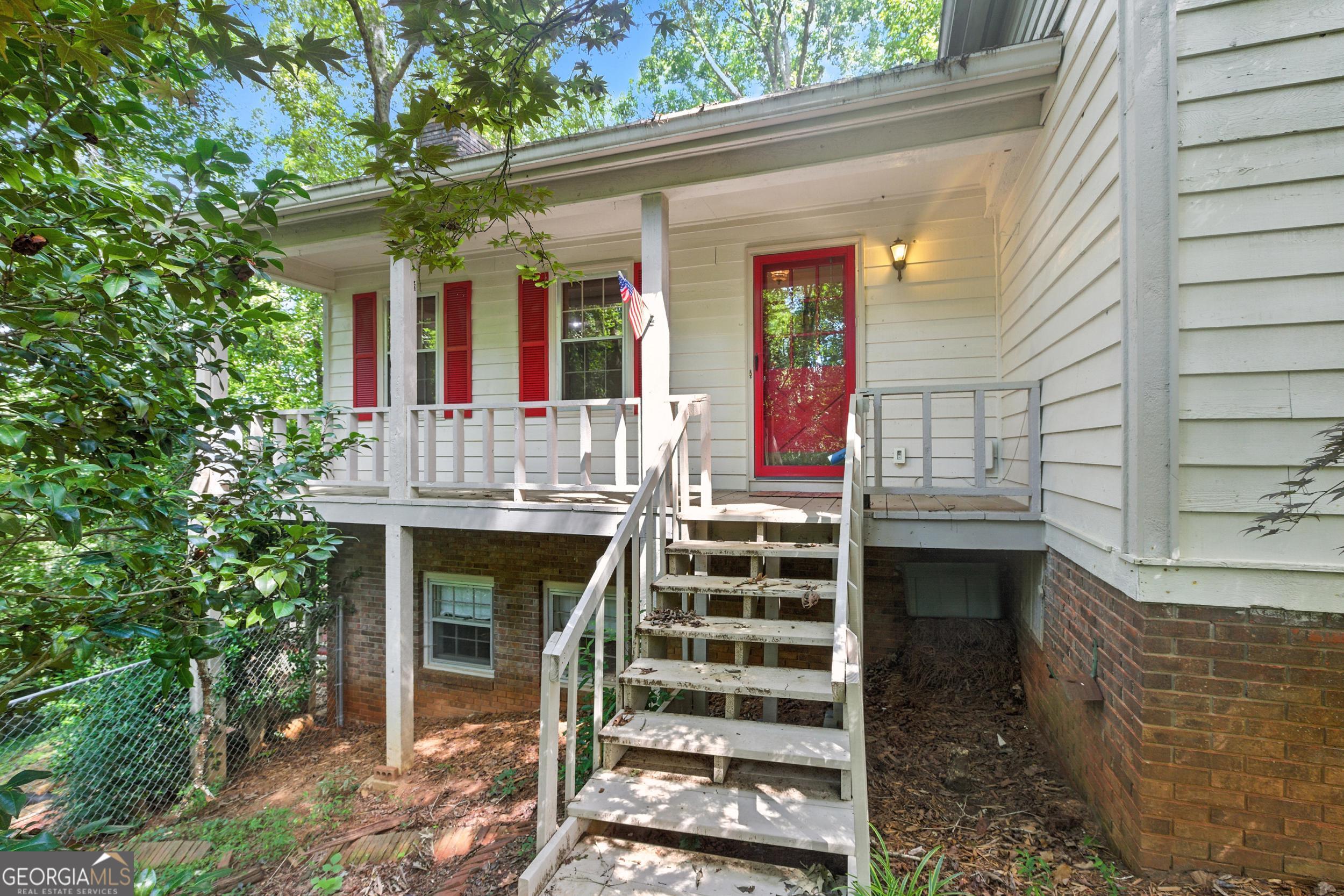Welcome to 29 Chestatee Springs Ln., a peaceful retreat tucked away in the heart of Georgia's Wine Country. This 3-bedroom, 2.5-bathroom home offers 2,050 square feet of comfortable living space with an open-concept layout perfect for both relaxing and entertaining. Enjoy the quiet and privacy of this tranquil property-no HOA restrictions-while being just minutes from everything you need: 10 minutes to Downtown Dahlonega, 5 minutes to Chestatee River access, 10 minutes to the University of North Georgia, and 20 minutes to the outlets. The spacious fenced-in backyard is ideal for pets or outdoor enjoyment, and the flowing floor plan creates a bright and inviting atmosphere throughout the home. Whether you're looking for a primary residence, weekend getaway, or a smart investment, this location offers unbeatable access and flexibility. Schedule your showing today and experience the perfect balance of quiet country living and nearby convenience! Contact me to schedule your private viewing.