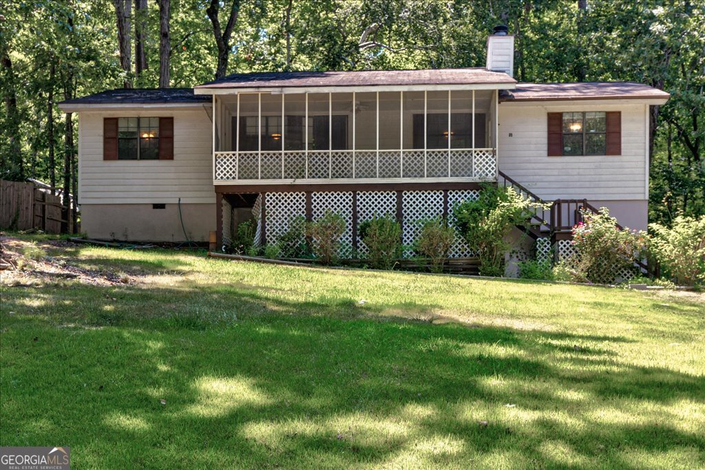 Start collecting lake-life stories before summer slips away. This is an affordable way into Turtle Cove. Nestled under the trees, this three bed, two bath ranch delivers the lake community lifestyle without the resort price tag. Feel the vibe: * Wake up to birds singing from the screened front porch, coffee in hand. * Host friends for sunset dinners on the deck built around old hardwoods. Inside, the layout is practical and ready for your style. The eat-in kitchen keeps conversation flowing, and the drive under garage hides every kayak, golf club set, and weekend project you can throw at it. Turtle Cove perks: 9 hole executive golf course, five white sand beaches with four boat ramps, pool, pickleball and tennis courts, clubhouse with dining room, lounge and year round events & parks and playgrounds that make golf carts the preferred ride. * You may finance with any lender, but every noncash offer must include a free prequal letter from Newrez Home Loan Division. Contact Sue Flesch - 678-570-1775, sue.flesch@newrez.com. Newrez has some great programs - give Sue a call. Offers on this home require a minimum Earnest Money Deposit of 1% of the Purchase Price or $1,000, whichever is greater.