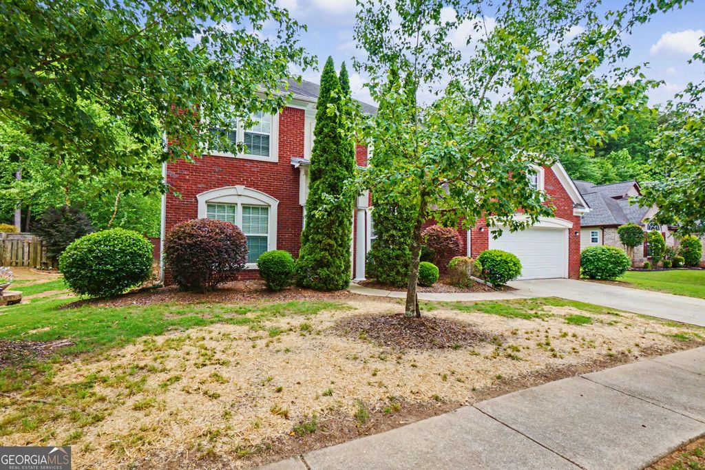 Photo of 5412 The Vyne Avenue, Atlanta, GA 30349 (MLS # 10771082)