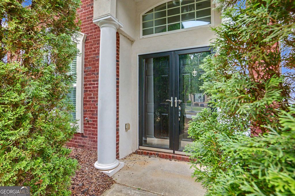 Photo of 5412 The Vyne Avenue, Atlanta, GA 30349 (MLS # 10771082)