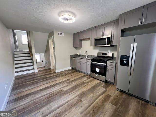 Welcome to 405 Fairburn Rd, SW- Unit 231, a first time Homeowners dream townhouse. This incredible 3-bedroom, 1 and 1/2 bath townhouse spans over 1.100 square feet, offering contemporary elegance and luxurious appointments. With spacious bedrooms and creative use of space, this property is versatile for relocating professionals, young families, and college students. Though situated in the rear of the community your unit overlooks the sunny playground, welcoming in natural light every morning. Owner occupants only.