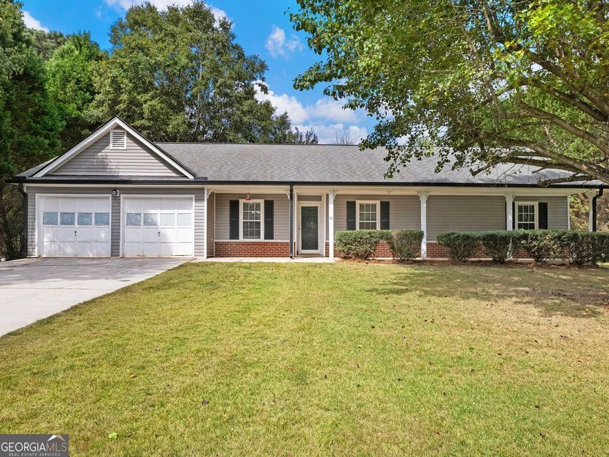 Charming Move-In Ready Home with Modern Touches and a Spacious Yard. Welcome to this beautifully maintained 4-bedroom, 2-bath home that blends classic curb appeal with thoughtful updates. The inviting front porch and manicured lawn set the tone for what awaits inside. Step through the front door to find a living area filled with natural light, perfect for both everyday living and entertaining. The kitchen features ample cabinet space, modern finishes, and easy access to the dining area. The owner's suite offers a private retreat with a spacious ensuite bath, while the additional bedrooms provide comfort and flexibility; ideal for a home office, guest room, or growing family. Outside, enjoy a large backyard with plenty of room for outdoor gatherings, gardening, or simply relaxing under the shade of mature trees.  Located in a quiet, established neighborhood just minutes from local schools, parks, shopping, and dining; this home has everything your family has been looking for.