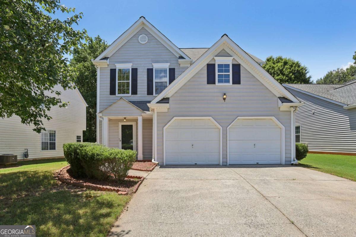 Move-in ready 3-bedroom home with great floor plan and lots of natural light in the popular Avensong community in Alpharetta, just minutes from Windward Parkway and 400! Updated kitchen with white cabinets, quartz counters, stainless steel appliances, modern fixtures, large breakfast area, and a view to the family room. Open family room with fireplace, additional separate dining area, and a half bath on the main. Updated flooring throughout the ground floor. The primary bedroom upstairs features tray ceilings, walk-in closet with built-in organizer system, and bathroom featuring updated vessel sinks, quartz vanity tops, vaulted ceilings, and separate tub and shower. Two spacious secondary bedrooms and additional full bathroom on second level. Plenty of closet space throughout. Refrigerator and washer/dryer included! Level yard with private buffer in the back. Awesome community amenities include a swimming pool, tennis courts, and playground!