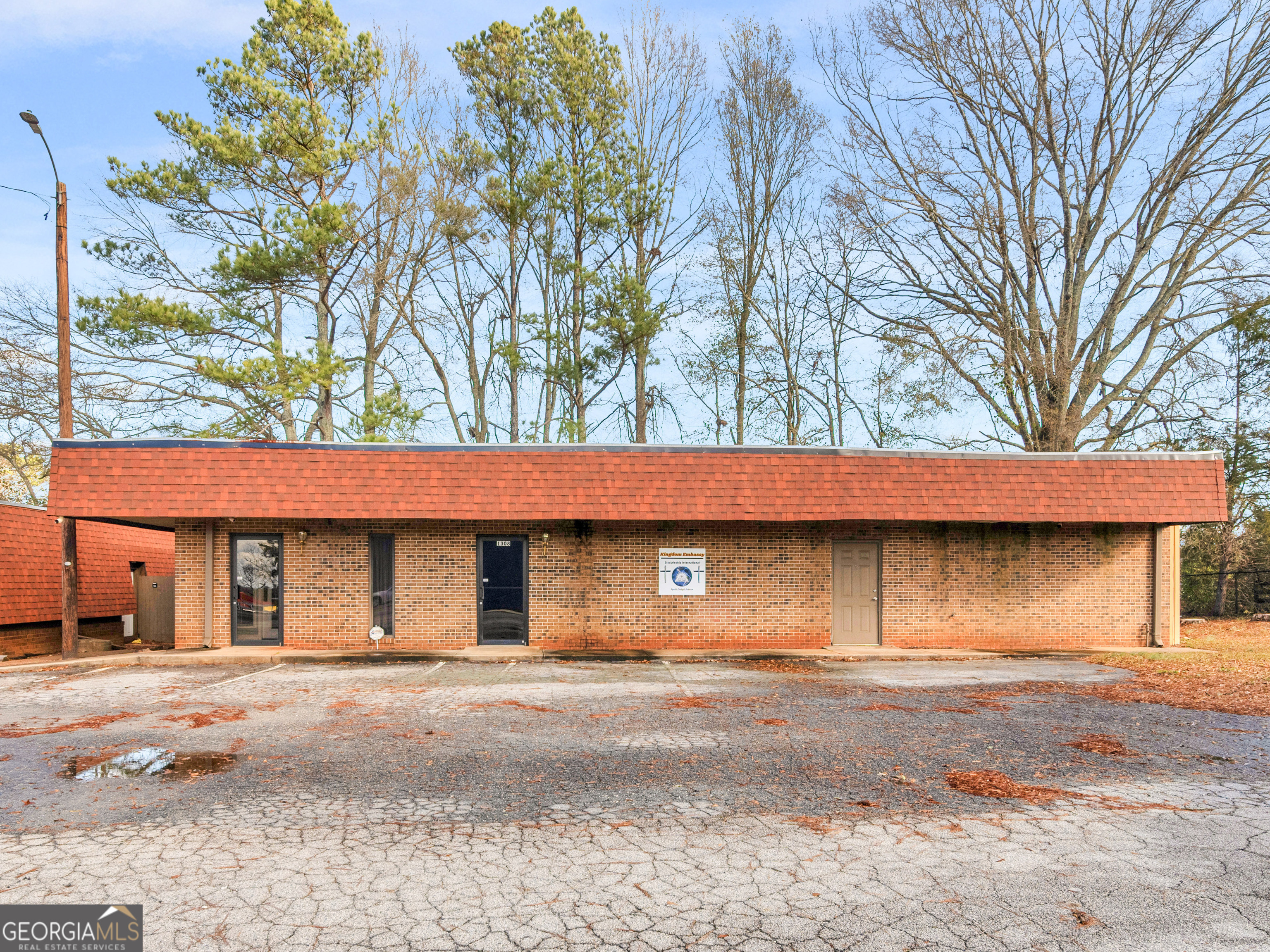 Schedule your showing of this 2442 square foot office building with large open spaces, three restrooms, and individual offices. The building was previously used as a church. The adjacent office building located at 1306 W Solomon Street which is 1740 square feet is also available..