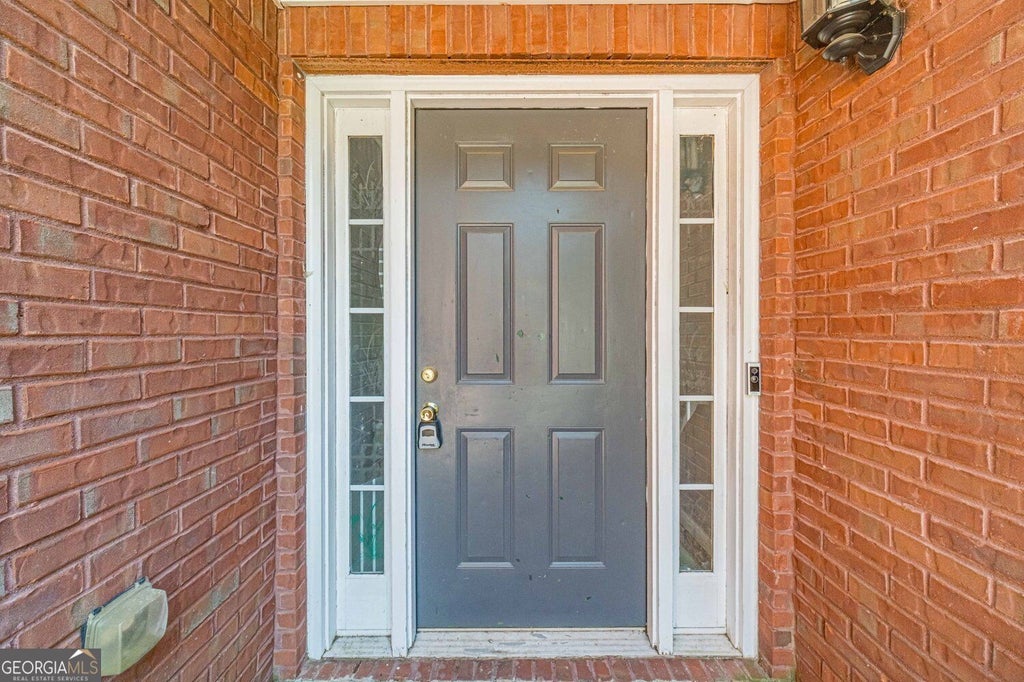 Photo of 1617 Amhearst Walk Road, Lawrenceville, GA 30043 (MLS # 10874447)